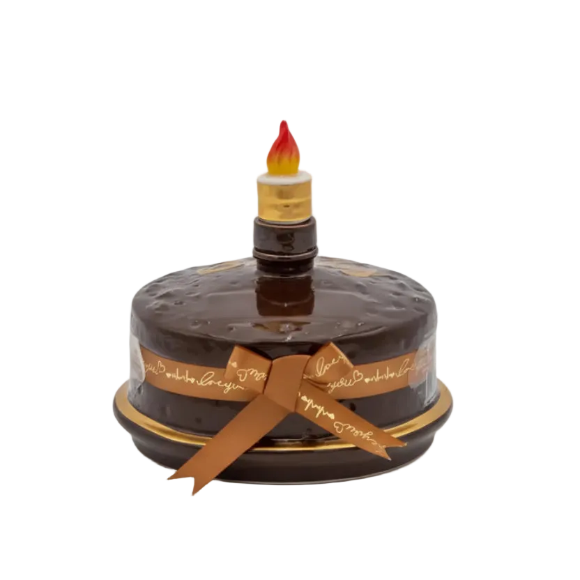 Oceano Azul Round Chocolate La Cake vodka in a round chocolate-colored cake bottle with ribbon and candle stopper.