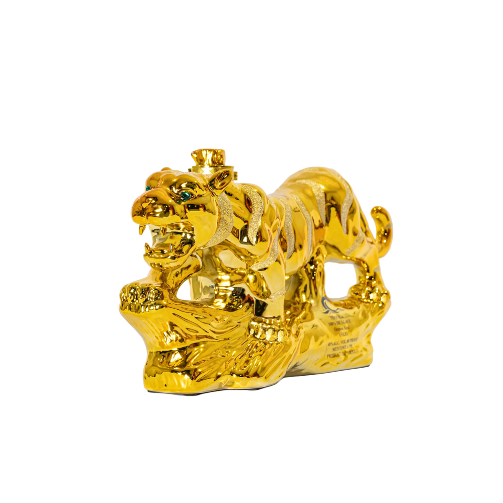 Front three-quarter view of the sculpted Oceano Azul Golden Tiger tequila bottle.