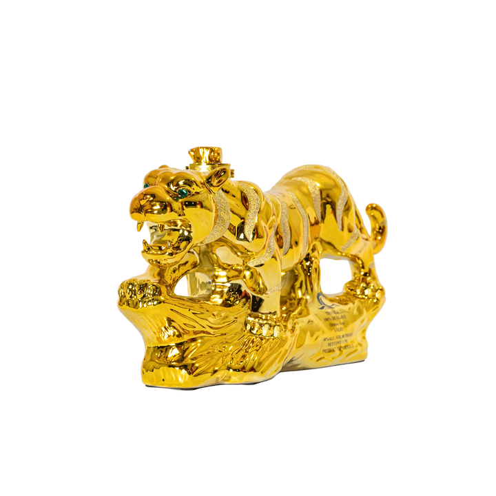 Front three-quarter view of the sculpted Oceano Azul Golden Tiger tequila bottle.