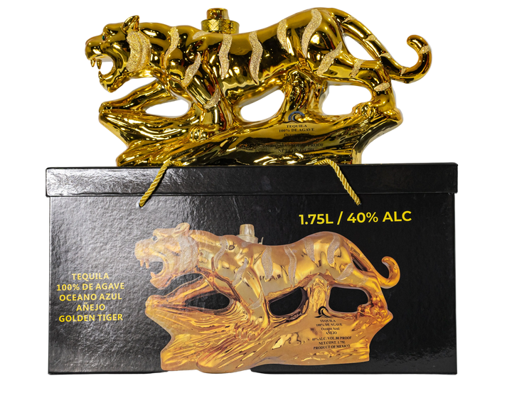 Oceano Azul Golden Tiger tequila bottle displayed on its black presentation box.