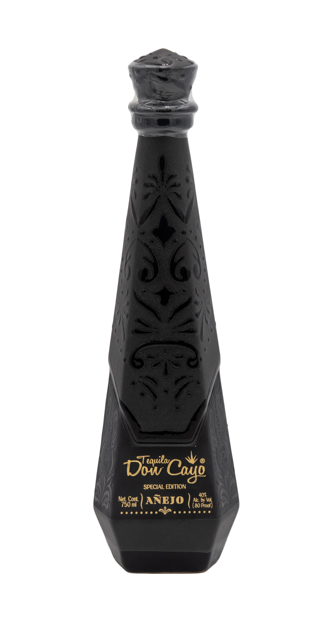 Don Cayo Añejo black ceramic tequila bottle with carved decorative patterns and gold lettering.