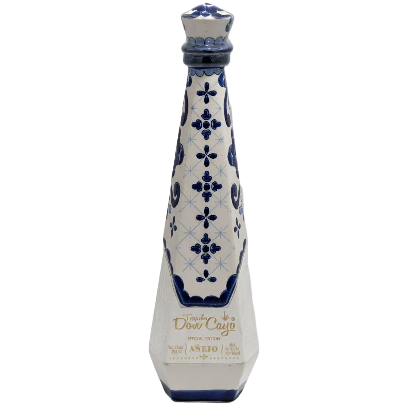 Don Cayo Añejo ceramic tequila bottle with blue floral decoration on white.