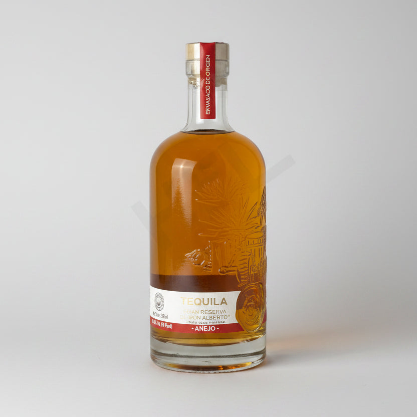 Bottle of Equila Rum Reserve on a white background