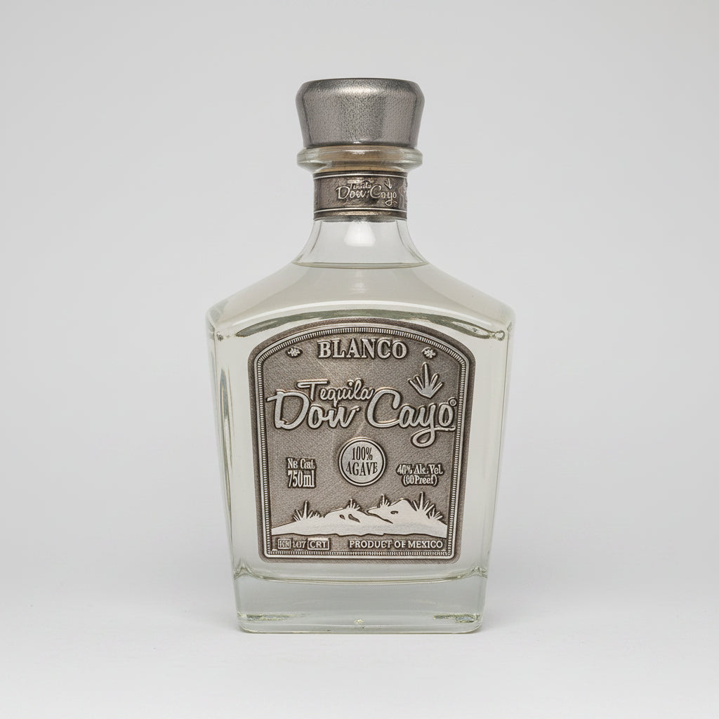 Tequila bottle with silver cap and label on a white background