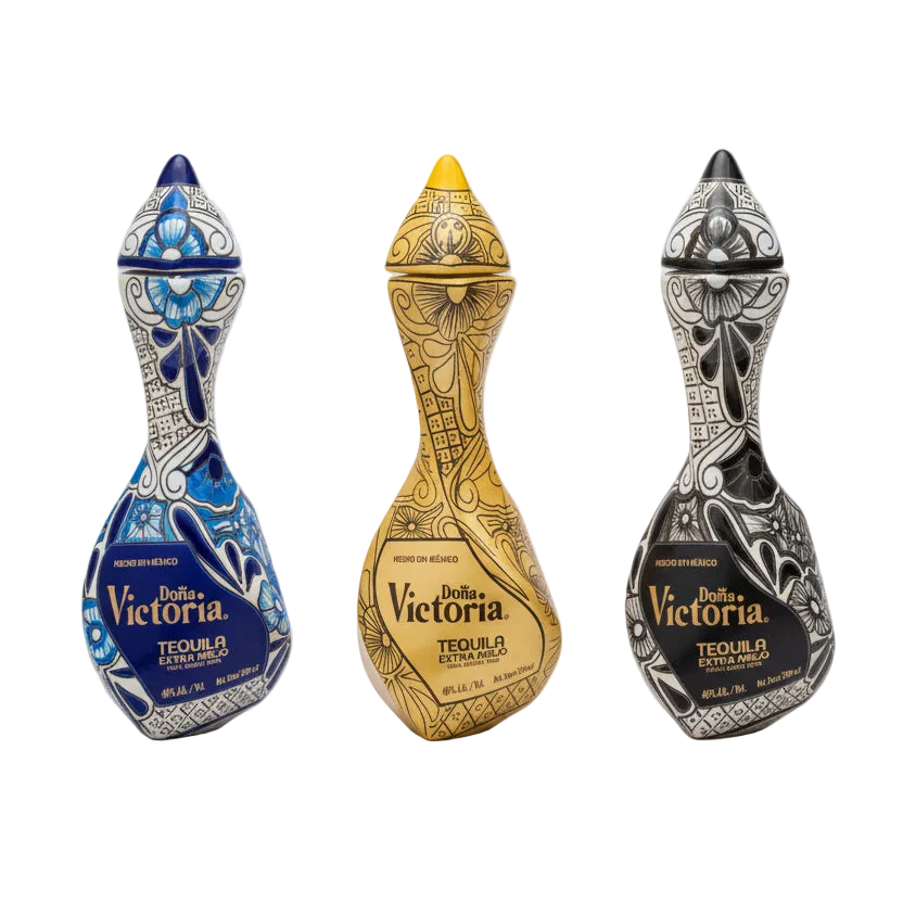 Dona Victoria Extra Añejo Tequila three-bottle bundle with blue, gold, and black decorated ceramic bottles.