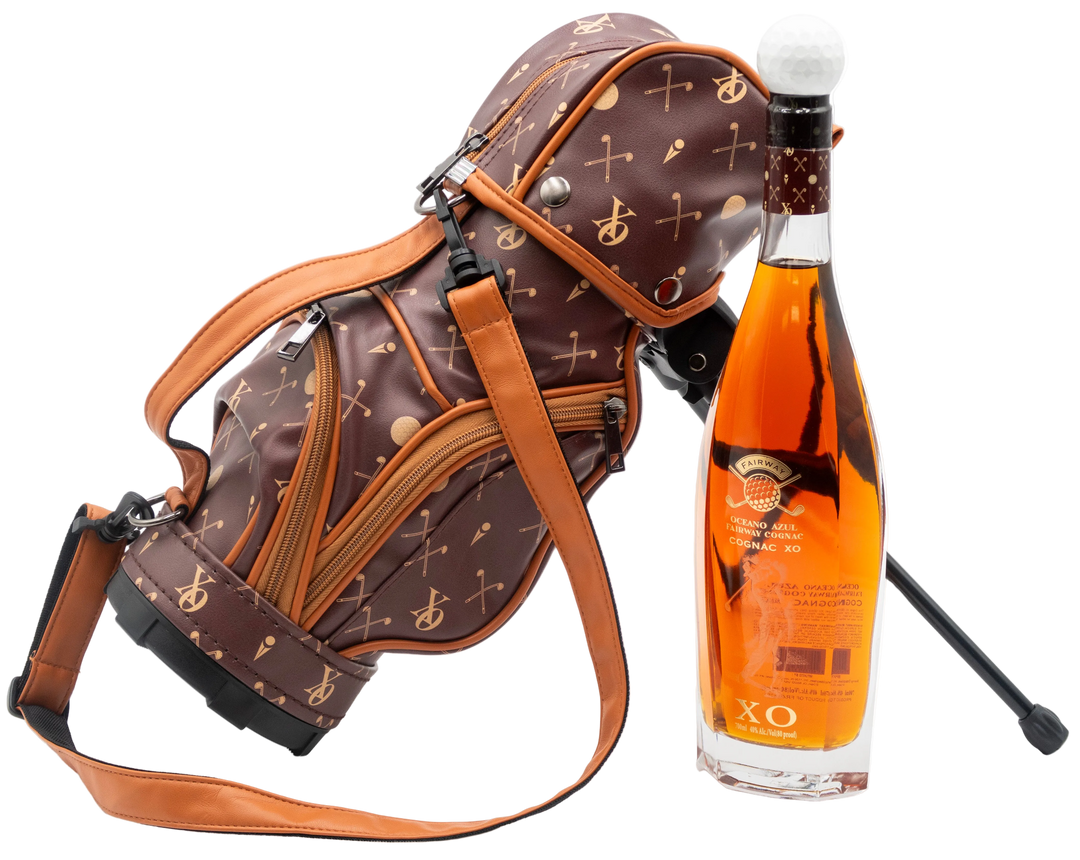 Oceano Azul Fairway Cognac XO bottle beside its patterned golf bag with stand and shoulder strap.