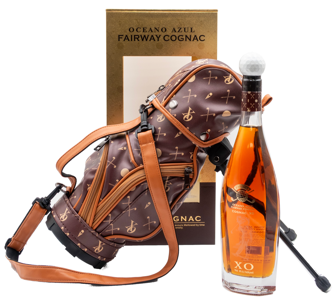 Oceano Azul Fairway Cognac XO bottle beside its patterned golf bag and gold presentation box.