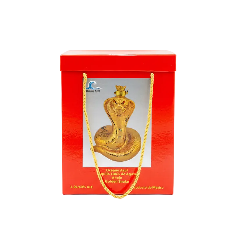 Gold snake-shaped liquor bottle in a red box with 'Oceano Azul' branding