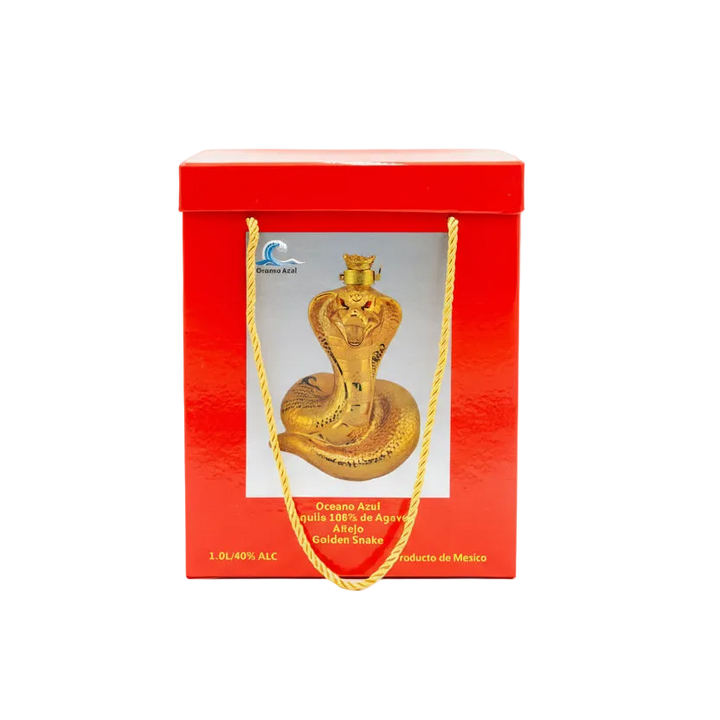 Gold snake-shaped liquor bottle in a red box with 'Oceano Azul' branding