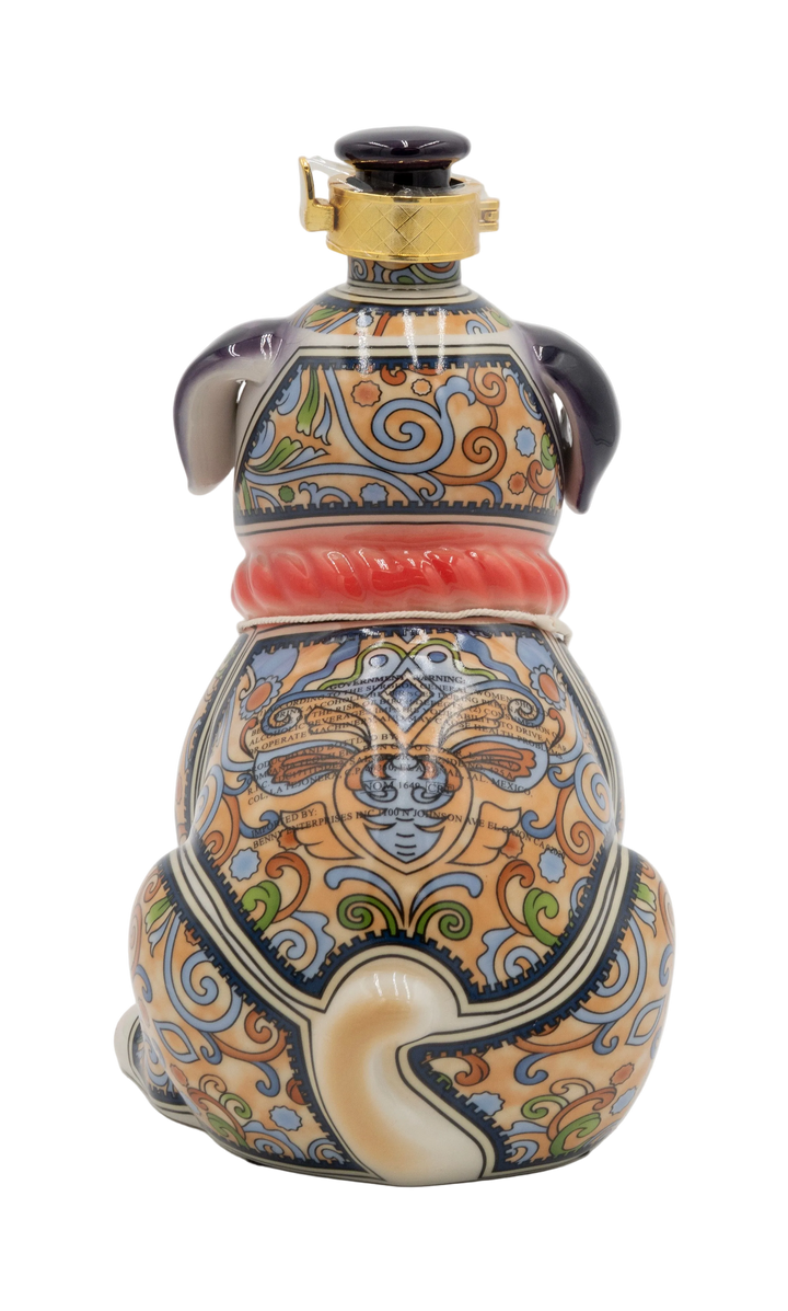 Decorative ceramic bottle with intricate patterns on a white background.