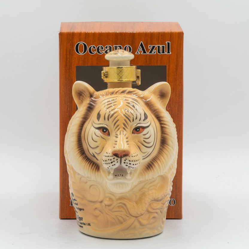 Wooden themed tequila box with a tiger head design and 'Oceano Azul' branding