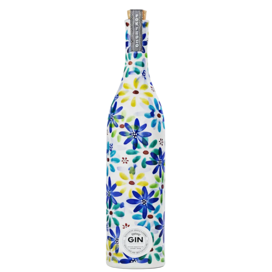 Porfidio Kutani Edition gin in a white ceramic bottle with blue, green, and yellow floral decoration.