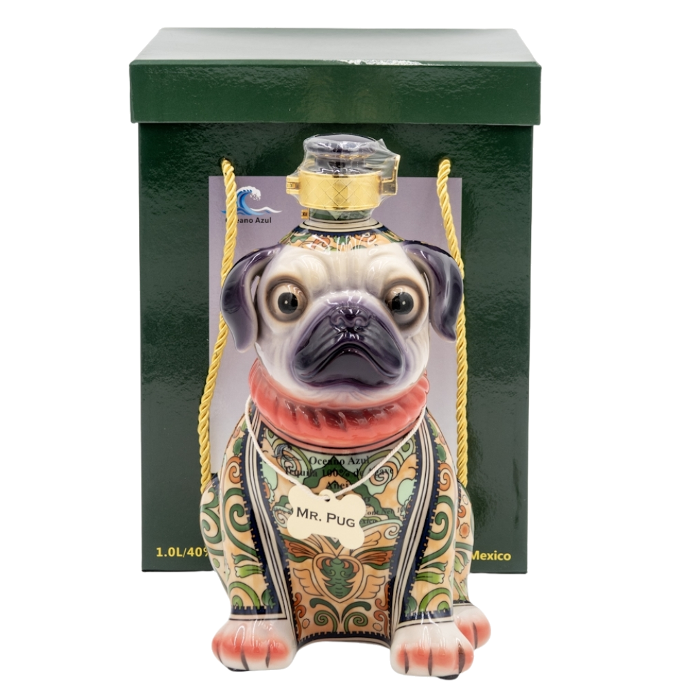 Decorative bottle shaped like a pug with a green box in the background