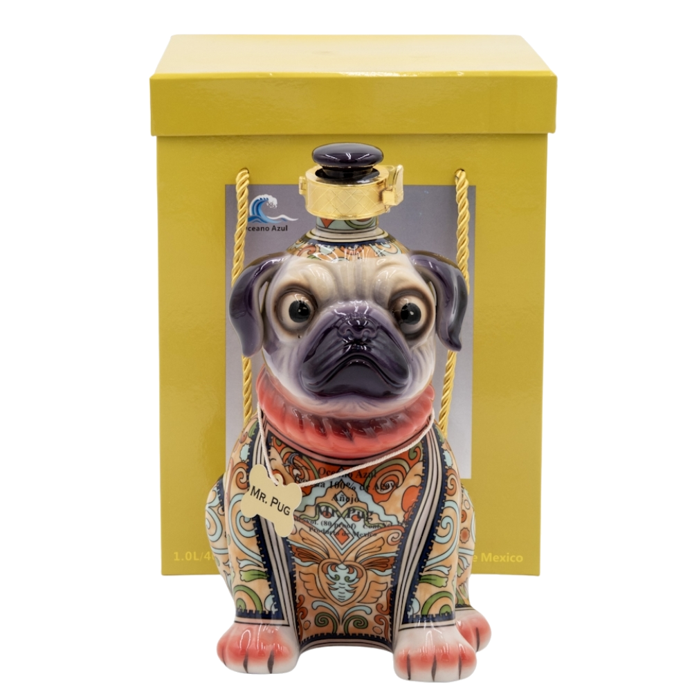 A sculptural bottle of Oceano Azul Pug Añejo Tequila, designed like a sitting dog.