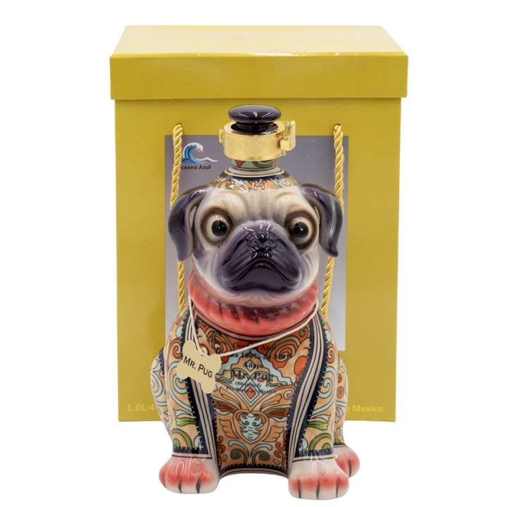 A sculptural bottle of Oceano Azul Pug Añejo Tequila, designed like a sitting dog.