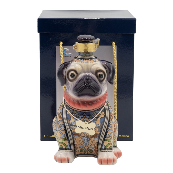 A sculptural bottle of Oceano Azul Pug Añejo Tequila, designed like a sitting dog.
