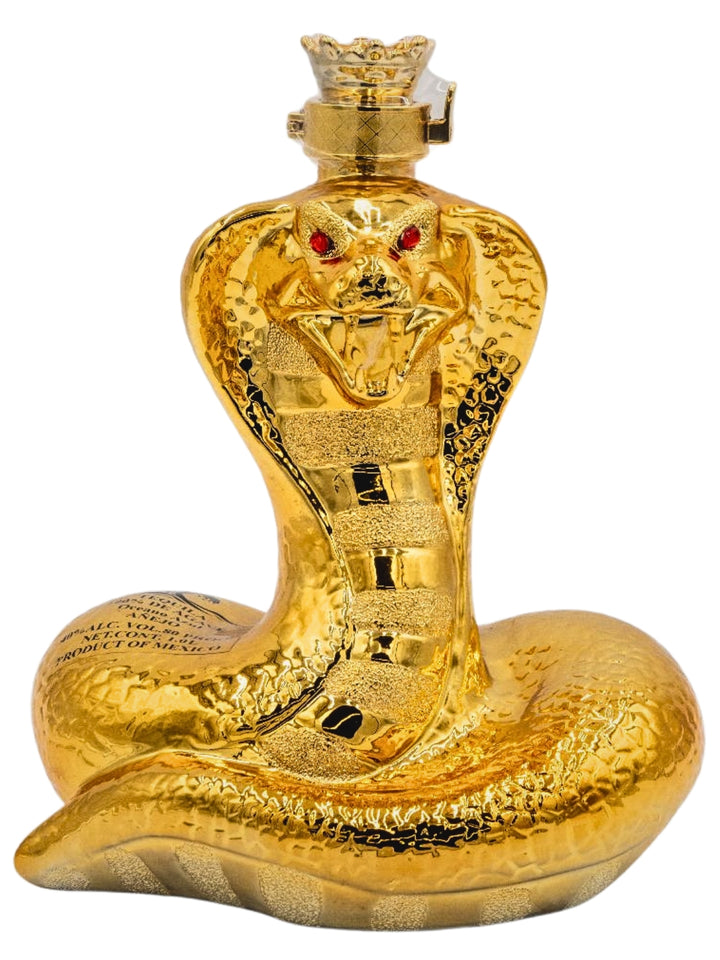 A sculptural bottle of Oceano Azul Golden Snake Añejo Tequila, featuring a coiled golden snake design with red eyes on the cap.