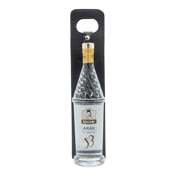 Kawar Gold Nobel Arak 53% 700ml bottle in front of its black carry bag.