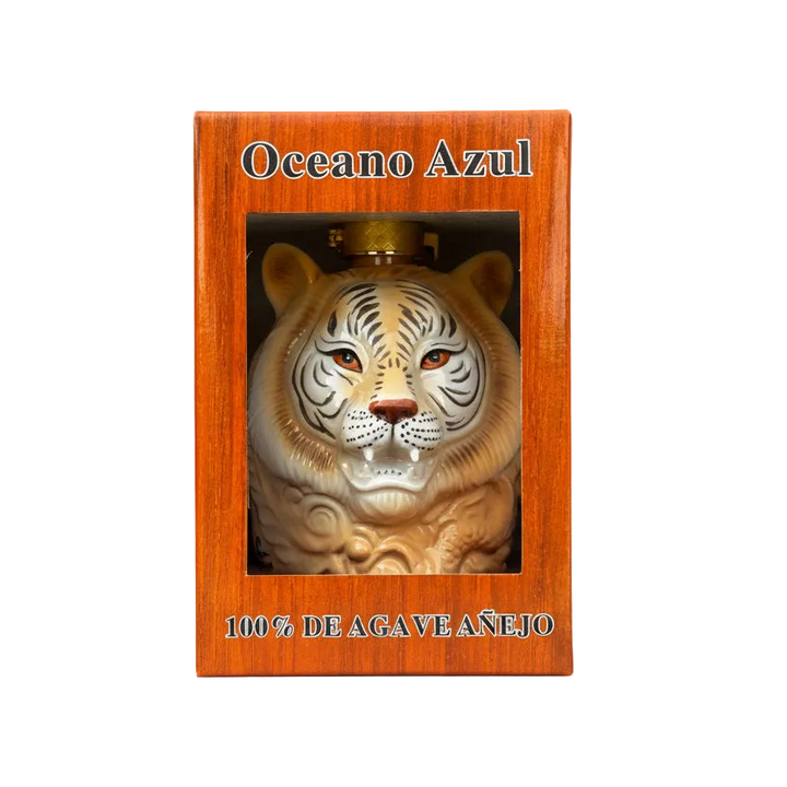 Oceano Azul White Tiger Anejo Tequila 1L ceramic bottle in its orange presentation box, front view.