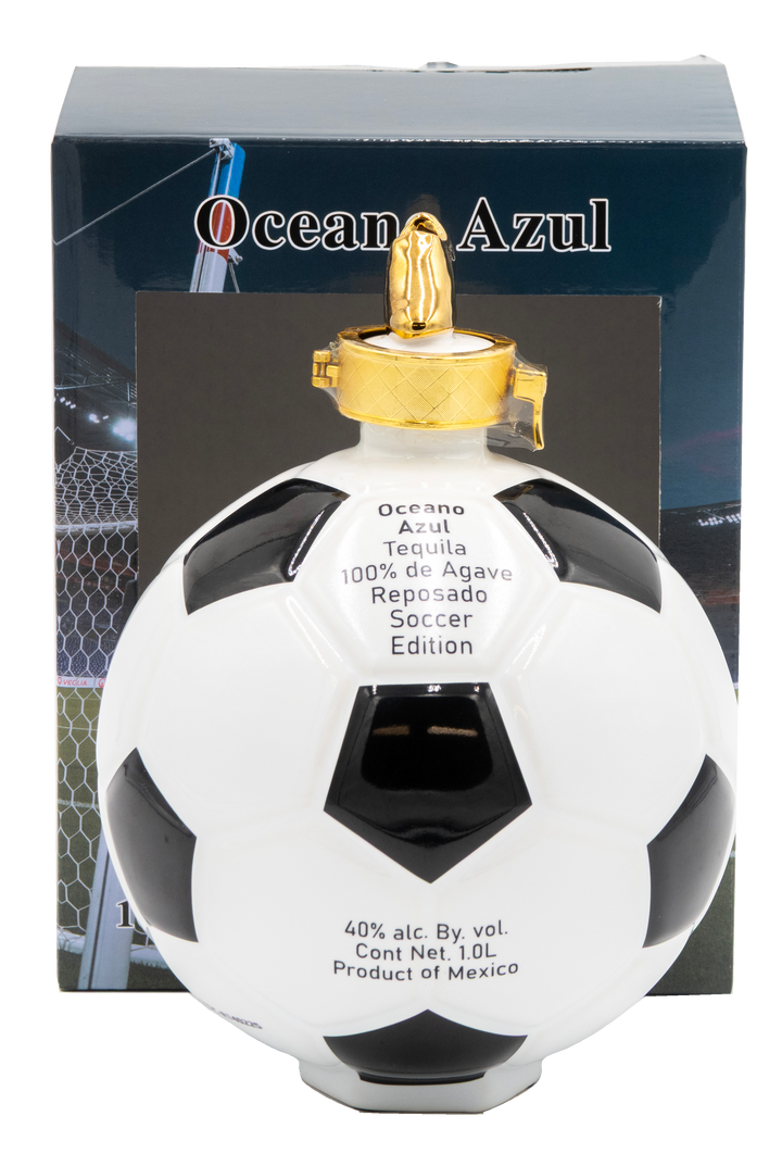 Oceano Azul Soccer Ball Reposado Tequila bottle with gold cap displayed in front of its presentation box.